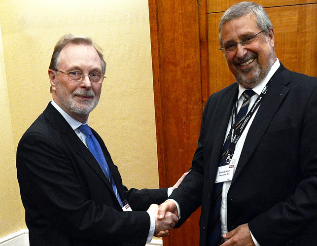 AILU President Neil Main (left) congratulates Prof Eckhard Beyer.