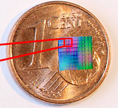 Detail of optical chip carrying a multitude of SiN micro resonators.