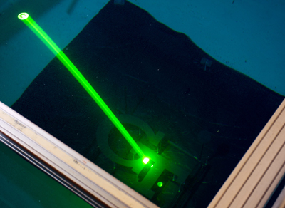 The lightweight lidar prototype uses a green laser to penetrate water at depth.