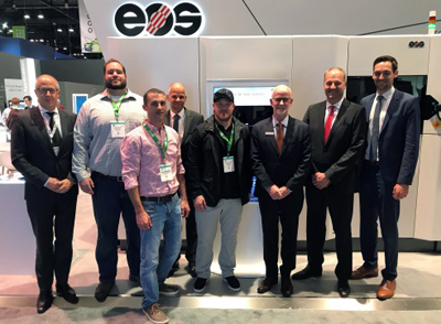 It's a deal: Visser Precision and EOS teams meet in Chicago. 