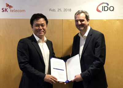 It's a deal: SK Telecom's Park Jung-Ho and Grégoire Ribordy, CEO of ID Quantique.