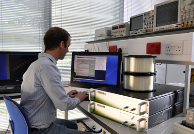 A Toshiba Research Europe scientist working on a QKD system.