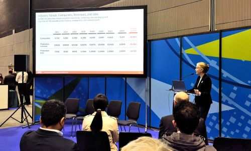 Positive growth: Amy Hanlon presents the latest industry data from the 2026 SPIE Global Industry Report. Photo: Matthew Peach, optics.org.