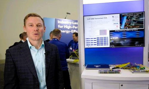 Rob Guzzon, Senior Manager of Photonic Systems Engineering at OpenLight, presenting its 1.6T DR8 PIC and evaluation board featuring a Marvell&reg; DSP at OFC 2026, last month.
