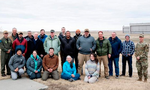 U.S. Naval Research Laboratory partners and observers gather during testing of dual-use power beaming and aerial defense system. U.S. Navy photo by Jonathan Steffen-Arnold.