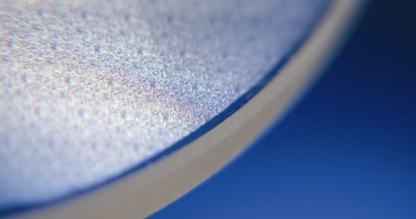 Calcium fluoride optics, such as this Jenoptik component, have a very wide transmission range and are crucial for advanced lithography applications using excimer lasers. ASML Optics