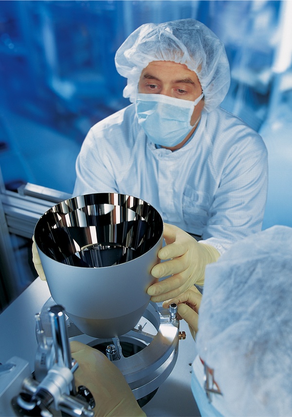 The Carl Zeiss semiconductor technology group was largely responsible for the wider company's return to form in 2009-2010, with revenues up by more than 200% after a major slump in the prior year. This image shows the ultra-high-precision reflective EUV optics developed for next-generation semiconductor lithography systems. Zeiss supplies the optics to ASML, the world's leading lithography system vendor. Credit: Carl Zeiss.