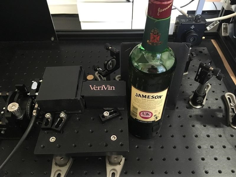 VeriVin uses Raman spectroscopy to distinguish between real and fake whiskies, without the need to open a bottle. The same technology can be used for similar analysis of wine, olive oil, and other liquids, to combat what some studies have suggested is a substantial problem with counterfeit goods. Photo: VeriVin/IOP.
