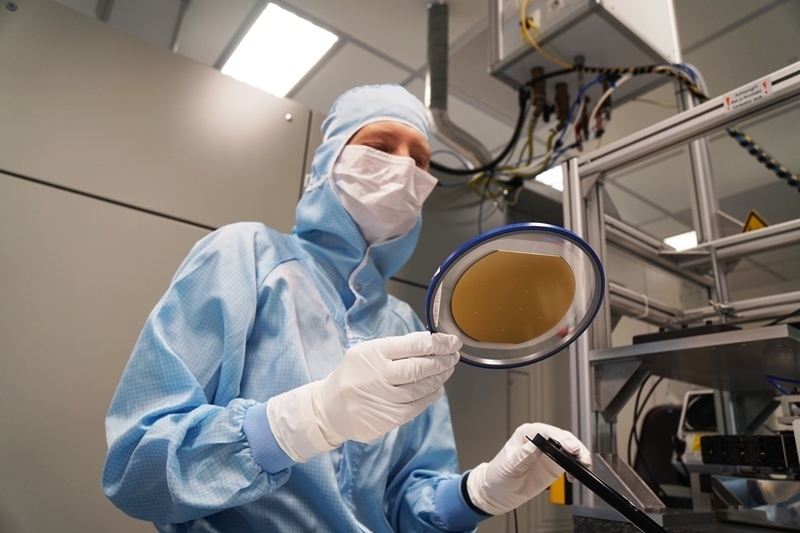 Production of VCSEL devices first requires the deposition of a complex sequence of compound semiconductor material layers - a process known as epitaxy, in which IQE specializes. Photo: Philips Photonics.