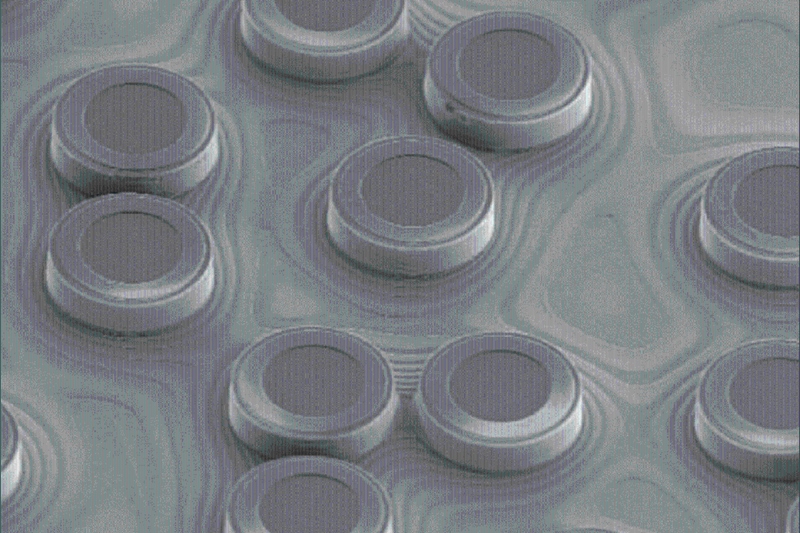 While ams says that its business is largely complementary with that of Osram, there are some areas where the two firms overlap and compete. For example, both have made recent investments in VCSEL production: ams acquiring Princeton Optronics, and Osram buying Vixar. Both are hoping that the emerging market for automotive lidar sensors becomes highly lucrative as autonomous systems become more widely deployed. This SEM image shows several tiny VCSEL emitters. Image: ams.