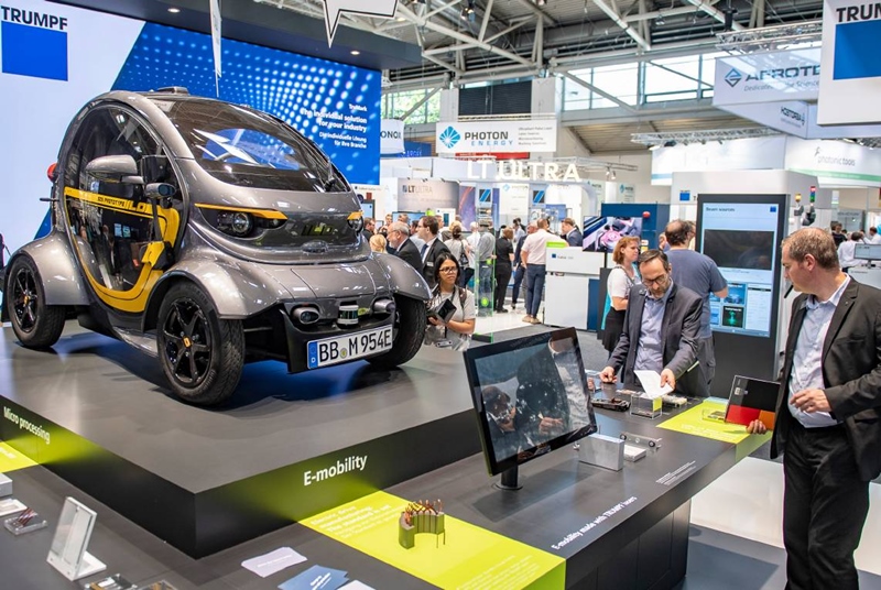 Trumpf's enormous booth at the recent LASER World of Photonics trade show in Munich highlighted, among other things, the increasingly important role that lasers are playing in automotive manufacturing - for example welding batteries used in electric vehicles. However, with the auto industry in the middle of a complex transition, current demand for lasers has slumped. Photo: Messe M&uuml;nchen.