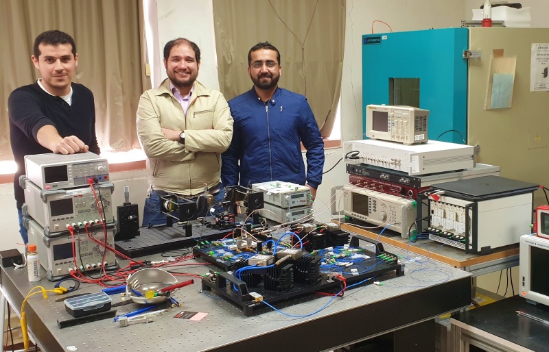 Research team with optical setup for the direct hyperspectral dual-comb imaging method. This approach expands the point-detection capabilities of current dual-comb systems to create a spectral image of an entire scene. Credit: Pedro Mart&iacute;n-Mateos, Universidad Carlos III de Madrid.