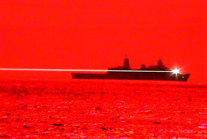USS Portland (LPD 27) - a San Antonio-class amphibious transport dock ship -conducted a Solid State Laser - Technology Maturation Laser Weapon System Demonstrator (LWSD) test in the Pacific, on May 16th. Image: US Navy.