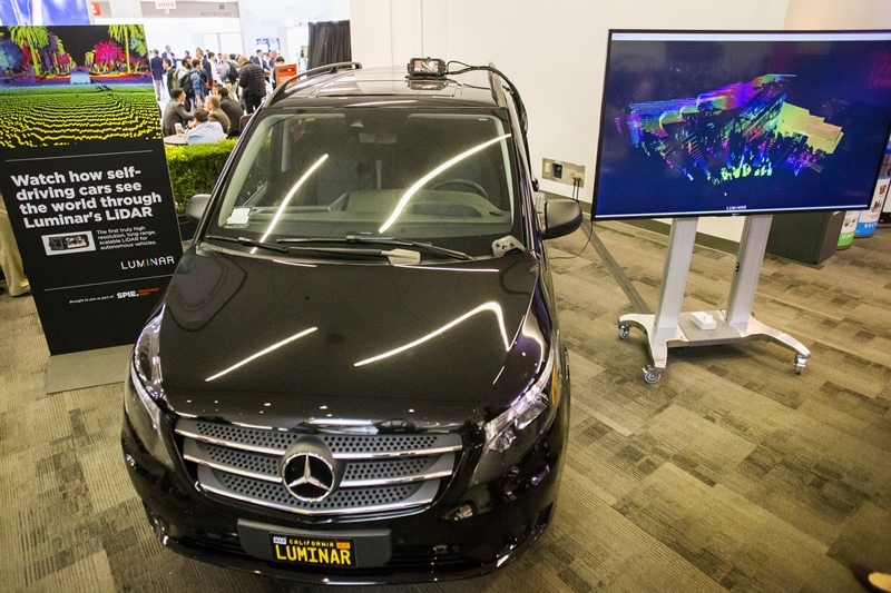 An early incarnation of Luminar's 1550nm fiber laser lidar technology, seen here on board a car at the SPIE Photonics West exhibition in 2018. Since then the hardware has been developed into more compact units, with costs expected to fall quickly as the company moves into series production with Volvo in a couple of years. Photo: Joey Cobbs/SPIE.