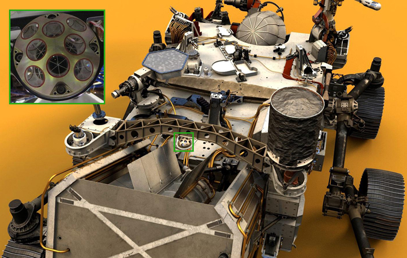 Visible near the center of NASA's Perseverance Mars rover in this illustration (green box) is the palm-size dome called the Laser Retroreflector Array (LaRA). In the distant future, laser-equipped Mars orbiters could use such a reflector for scientific studies. Perseverance was built and is operated by NASA's Jet Propulsion Laboratory, a division of Caltech in Pasadena, California. The retroreflector was provided by Italy's National Institute for Nuclear Physics, which built the instrument on behalf of the Italian Space Agency. Image: NASA.