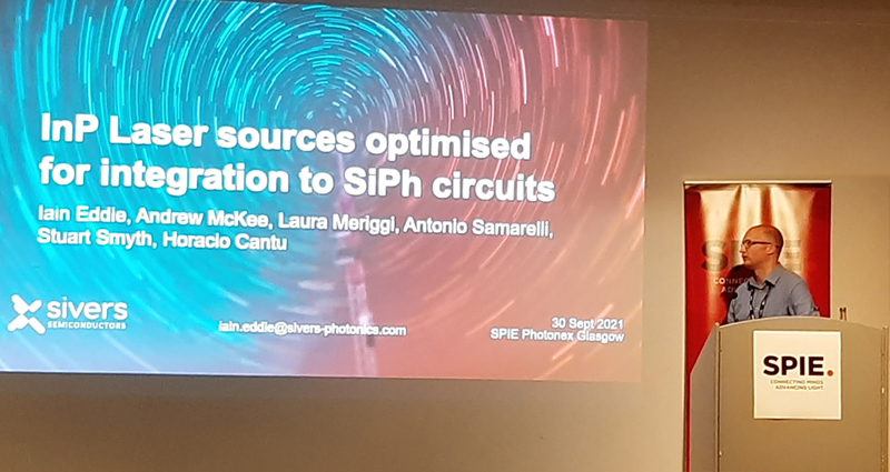 Dr Iain Eddie, Director of Device Engineering, presents Sivers Photonics technology at last week's Photonex + Vacuum Technologies conference in Glasgow. He was talking about SP's InP100 Platform, a common design and manufacturing framework for InP photonics devices, using established process modules to produce a broad range of device types on 100mm wafers. Image courtesy of Sivers Photonics / twitter.