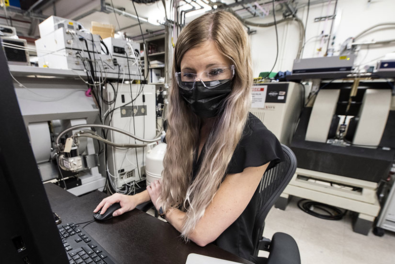 Researcher Abigail Meyer, a Ph.D. candidate at the Colorado School of Mines and National Renewable Energy Laboratory, is the lead author of a new paper detailing efforts to pinpoint the source of the LID phenomenon. Photo by Dennis Schroeder, NREL.