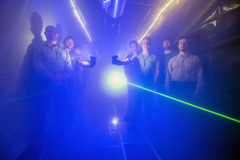Foggy notions: Members of Sandia National Laboratories' fog chamber research team inside the facility after setting up for an experiment. This photo was taken prior to the Covid19 pandemic. Photo: Randy Montoya, SNL.
