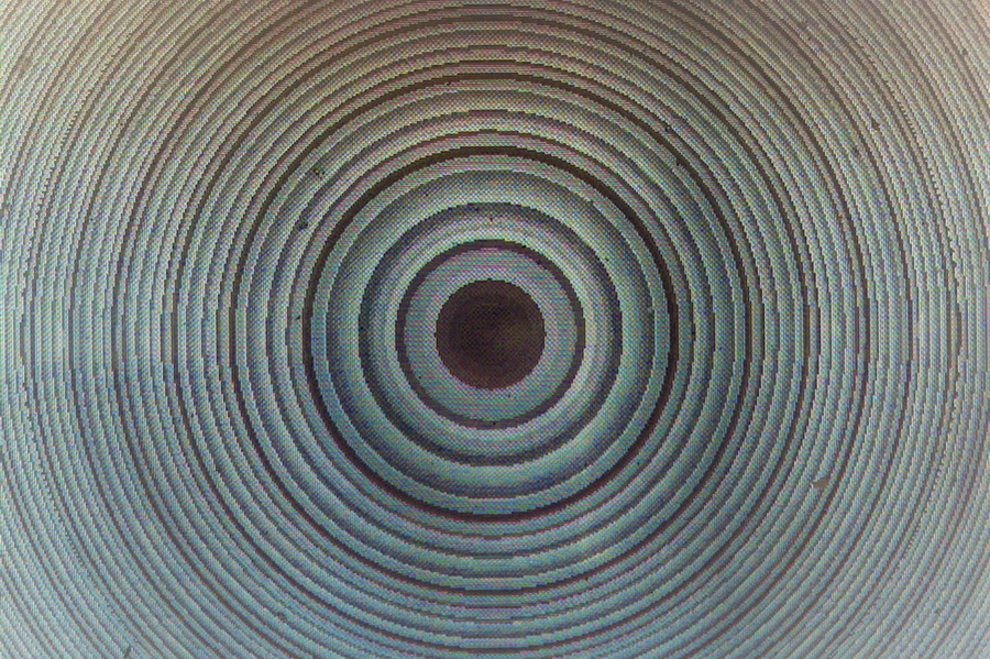 A microscopic view of the metalens surface. Credit: MIT.