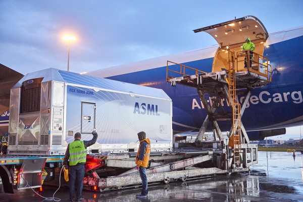 ASML equipment is loaded onto a freight airliner at Amsterdam's Schipol airport. Company CEO Peter Wennink says that, in addition to demand from chip manufacturers, ASML is set to benefit from a trend towards 