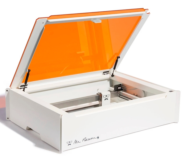 A desktop diode laser cutting machine from Mr Beam. By replacing spherical and cylindrical lenses with a single, freeform optic, the optical system can be shrunk, while improving beam quality and depth of focus for cutting thicker materials. Image: Mr Beam.