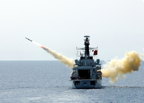 A Royal Navy Type 23 frigate, shown here firing a conventional weapon back in 2002. The Type 23 has been selected to trial a high-power laser weapon capable of destroying UAVs, with deployment anticipated from 2023. Image: US Navy photo by Photographer's Mate 2nd Class Isaac Merriman.