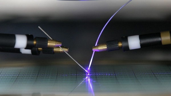 The German consortium is aiming to develop a low-cost assay capable of identifying drug-resistance forms of TB in the field, using a photonic integrated approach to time-resolved fluorescence detection. This image shows characterization of new optoelectronic sensors on the wafer assembly by project partner IMMS (Institute for Microelectronic and Mechatronic Systems). Photo: IMMS.
