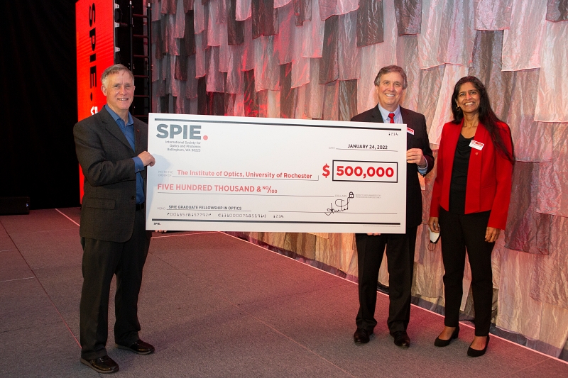 Announced at this week's SPIE Photonics West event in San Francisco, the society's latest $500,000 grant will go towards supporting graduate students at the University of Rochester's Institute of Optics. Pictured, from left, are the institute's interim director Thomas Brown, SPIE CEO Kent Rochford, and current SPIE president Anita Mahadevan-Jansen. Photo: SPIE.