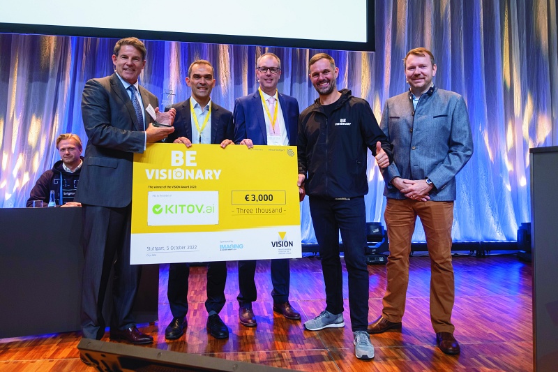 Kitov.ai's VP of Americas Corey Merchant (far left) collects the VISION Award at Messe Stuttgart. The Israeli firm, which has developed software to streamline the deployment of machine vision systems in complex part manufacturing, beat 60 other entrants in the competition. Photo: Messe Stuttgart.