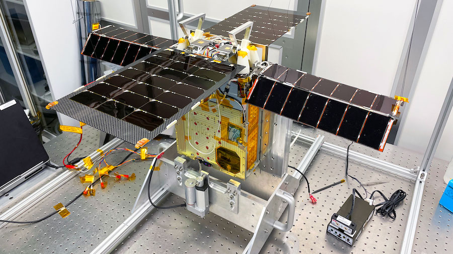 Earlier this year, NASA's Lunar Flashlight mission underwent tests to prepare it for launch in November 2022. The solar-powered small satellite is shown here with its for solar arrays extended in a Georgia Tech clean room. Credit: NASA/JPL-Caltech.