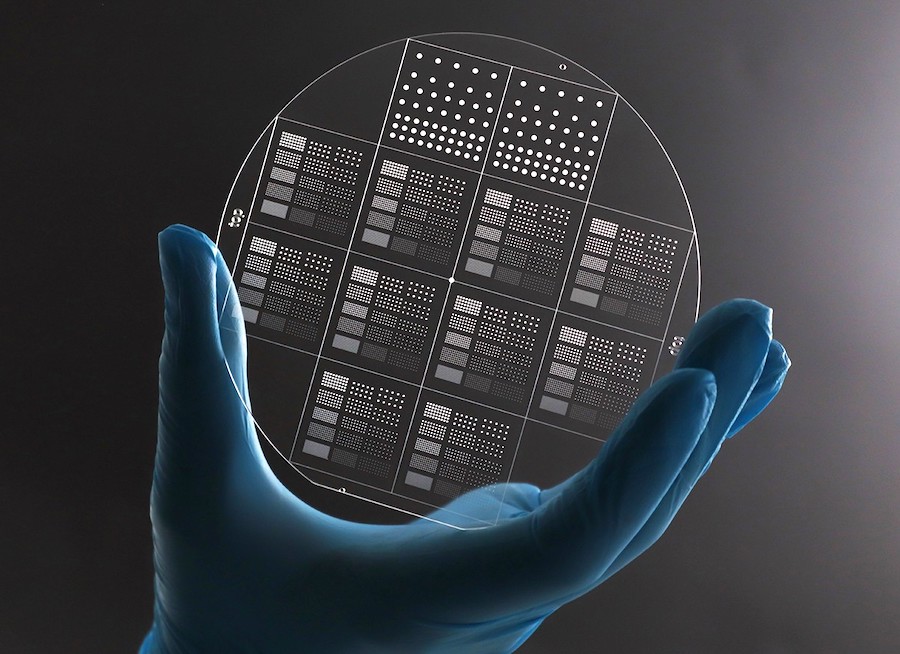 The microstructured wafer showing individual 22 x 22 millimeter chips, and wells from 50 to 400 microns diameter. Credit: LPKF Laser & Electronics AG.