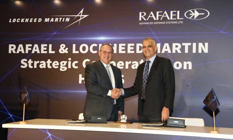 Lockheed Martin's COO Frank St. John, with Rafael CEO and president Maj. Gen. (Ret.) Yoav Har-Even. The two defense contractors are now working together to develop and manufacture high-power laser weapons. Photo: Lockheed Martin.