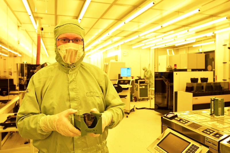 SMART Photonics CTO Luc Augustin, pictured here with a wafer on which PICs have been fabricated. SMART Photonics is part of the PhotonDelta ecosystem that is set for a major boost, thanks to a &euro;1.1 billion investment led by the Netherlands government. Photo: PhotonDelta.