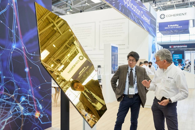 Coherent's booth - featuring a replica of a segment of the James Webb Space Telescope's primary mirror - at April's LASER World of Photonics trade show. Although II-VI instigated the takeover of Coherent, the merged entity will now be rebranded under the name of the historic laser manufacturer. Photo: Messe M&uuml;nchen/Holger Rauner.