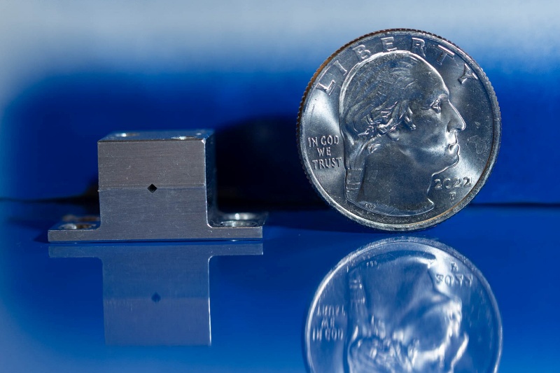The terahertz QC laser, initially developed by Longwave Photonics and Qing Hu's MIT research group, generates a high-powered beam in a portion of the spectrum where traditional lasers struggle to emit. The tiny size of the device and the heterodyne spectrometer based around it suggest that the technology could be used in future CubeSat and handheld applications. Photo: NASA/Michael Giunto.
