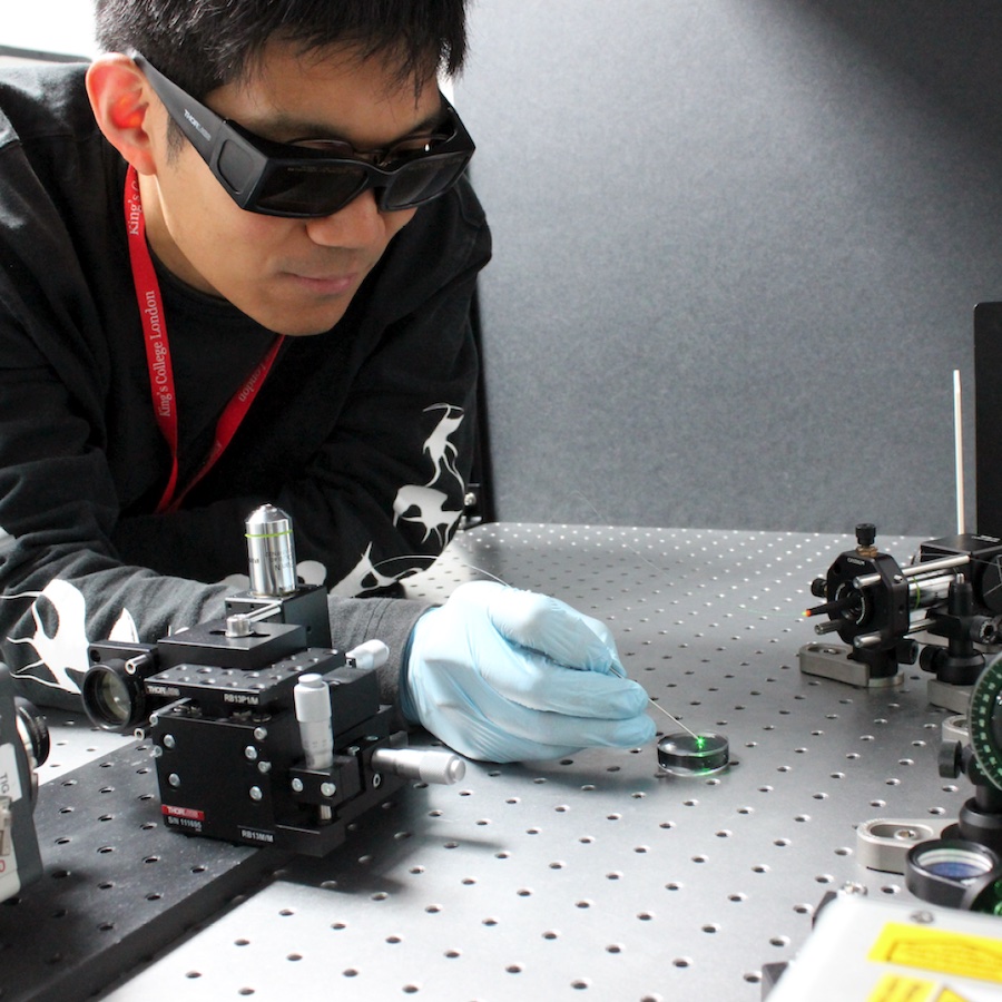 Tianrui Zhao of KCL operating a photoacoustic imaging endoscope probe that can fit inside a medical needle with an inner diameter of just 0.6 millimeters. Credit: Tianrui Zhao.
