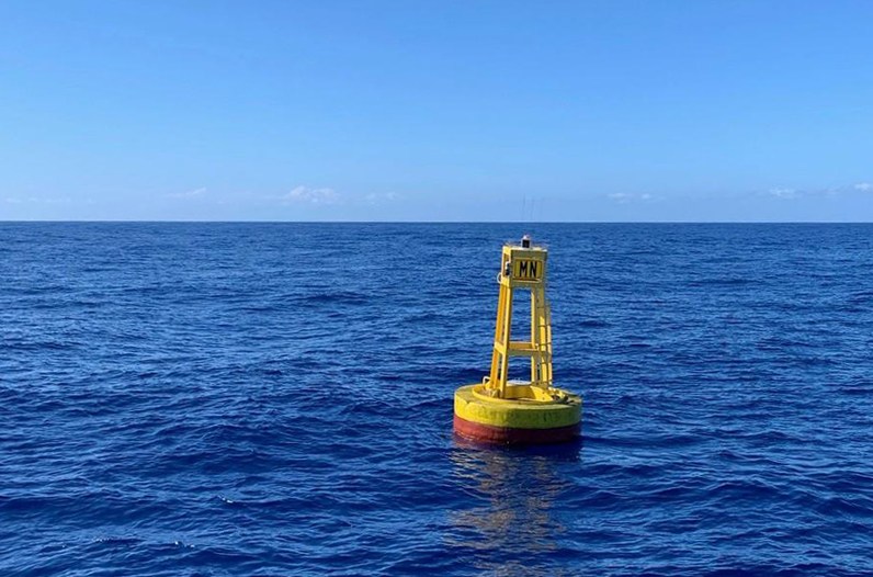 The Marine Optical Buoy (MOBY) is located 20 kilometers off the coast of Hawaii. It consists of two buoys: the optical buoy and the mooring buoy. The optical buoy contains the sensors which extend into the ocean water, while the mooring buoy keeps the optical buoy in place. 
Credit: Moss Landing Marine Laboratories, Marine Optical Buoy Project.