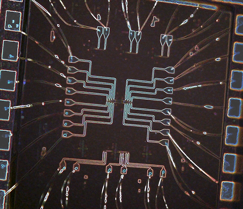 An optical image of the electrically controlled coupled cavity array in the team's silicon photonic chip. The image depicts the wiring structure and optical micrograph of the coupled cavity array. Credit: Abhi Saxena/University of Washington.