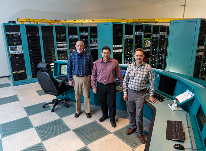 When the NIF laser delivered 2.2 MJ of laser energy, it started here in the Master Oscillator Room (MOR). Larry Pelz, Jean-Michel Di Nicola and John Heebner played key roles in this accomplishment along with the other MOR and High-Fidelity Pulse Shaping team members. Photo by Jason Laurea/LLNL.