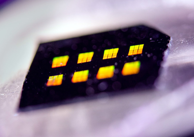 A metasurface sample is used for the beam steering with each reflective patch containing thousands of meta-atoms designed to dynamically steer incoherent light. Photo: Craig Fritz, SNL.