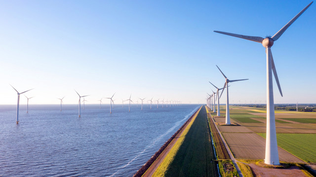 Monitoring the condition of wind turbine blades. Image courtesy of UK National Grid.