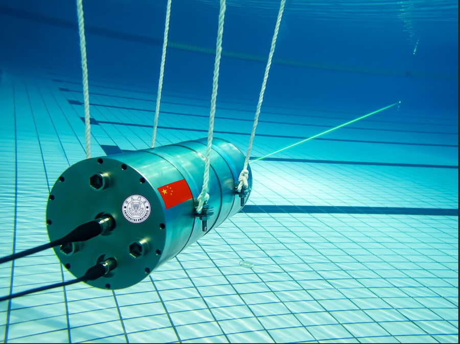 Researchers developed a single-photon Raman lidar system that operates underwater and can remotely distinguish various substances. They demonstrated the system by using it to detect varying thicknesses of gasoline oil in a quartz cell that was 12 meters away from the system in a large pool. Credit: Mingjia Shangguan, Xiamen University 