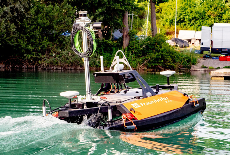 The USV in action, using the autonomous capabilities and sensors for underwater and above-water mapping fitted as part of the TAPS project. &copy; Fraunhofer IOSB.