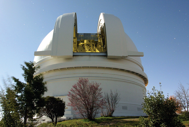 The Hale Telescope at Caltech's Palomar Observatory in San Diego County, California, will receive the high-rate data downlink from the DSOC flight transceiver. The telescope is fitted with a novel superconducting detector that is capable of timing the arrival of individual photons from deep space. Credits: Caltech.