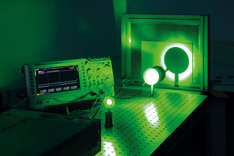Visible scattered light from the 532nm output of a laser in the laboratory of InnoLas Laser GmbH in Krailling. &copy; InnoLas Laser GmbH.