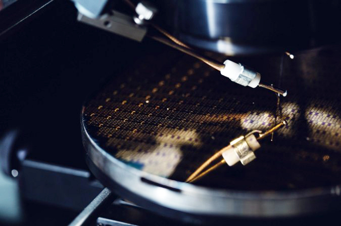 Kudos for Kubos: A 150-mm wafer of GaN LEDs under test via wafer probing. Source: Kubos Semiconductors.