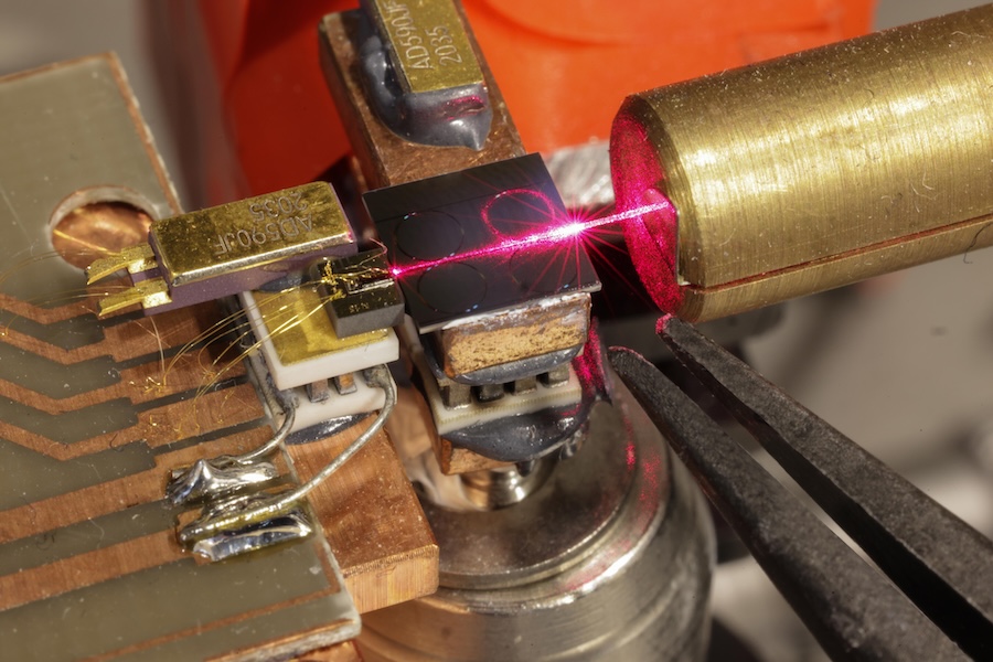 The micro-resonator being activated by a semi-conductor laser. Credit: EPFL/Alain Herzog.