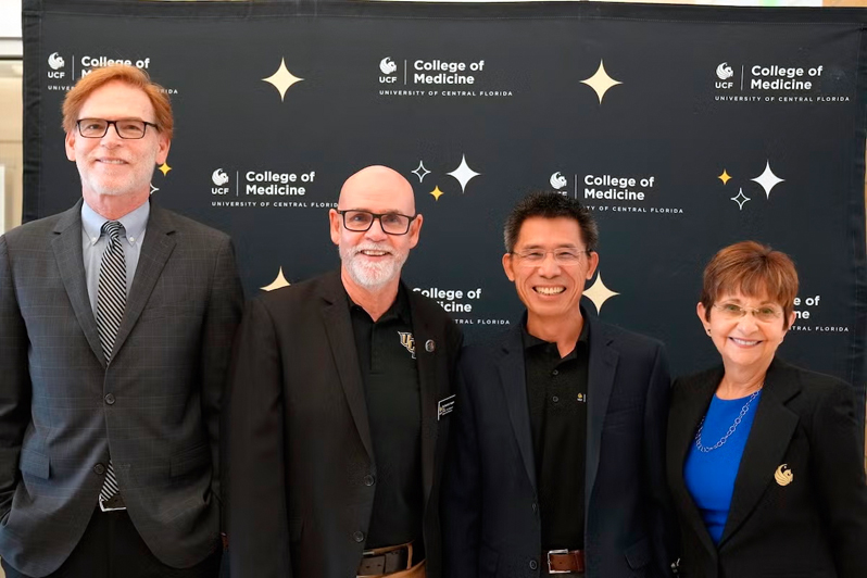 Officials announce UCF's new biophotonics lab. Right to left: Deborah German, vice president for health affairs and dean, College of Medicine; Guifang Li, professor, College of Optics and Photonics; David Hagan, dean, College of Optics and Photonics; Bruce Tromberg, National Institute of Biomedical Imaging and Bioengineering at the National Institutes of Health. Photo: CREOL / UCF.