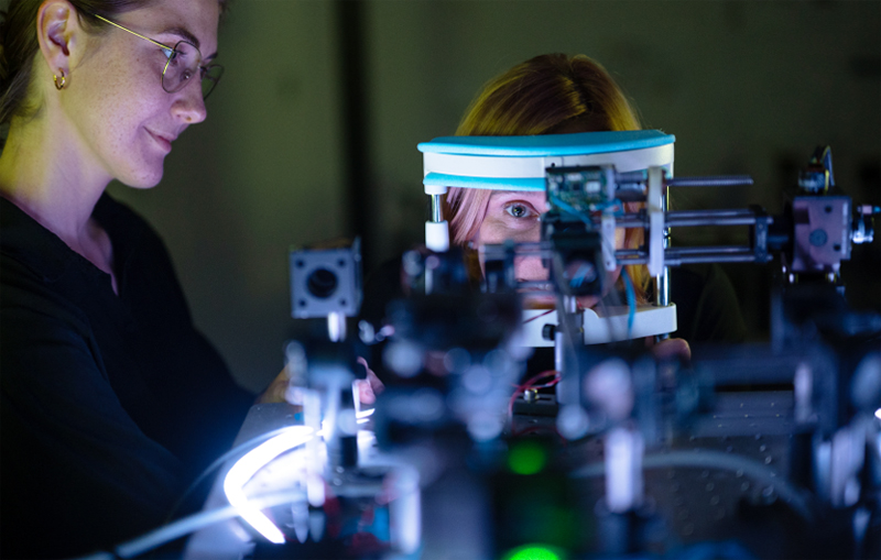 Two-photon vision is a novel method with great potential for the future of ophthalmic diagnostics. Pictured are scientists Oliwia KaczkoÅ› (left) and Katarzyna Komar. Photo: Dr. Karol Karnowski / ICTER.
