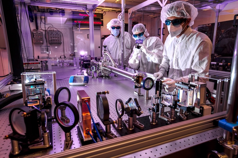 From left: Drew Willard, Brendan Reagan and Issa Tamer work on the Big Aperture Thulium (BAT) laser system. Credit: Jason Laurea/LLNL.
